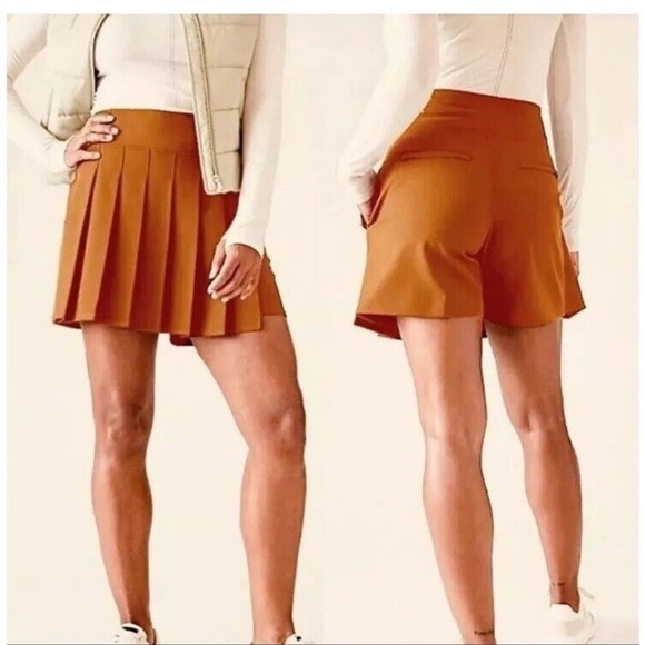 Athleta Dresses & Skirts - NWOT Athleta High Rise Endless Pleated Rust Orange Skort Shorts